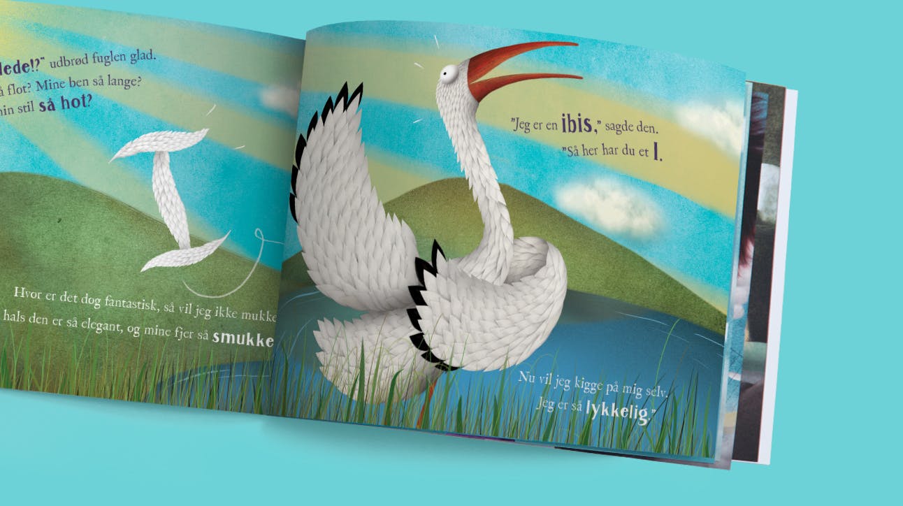 A picture of one of the book spreads with an ibis (bird) showing the letter I