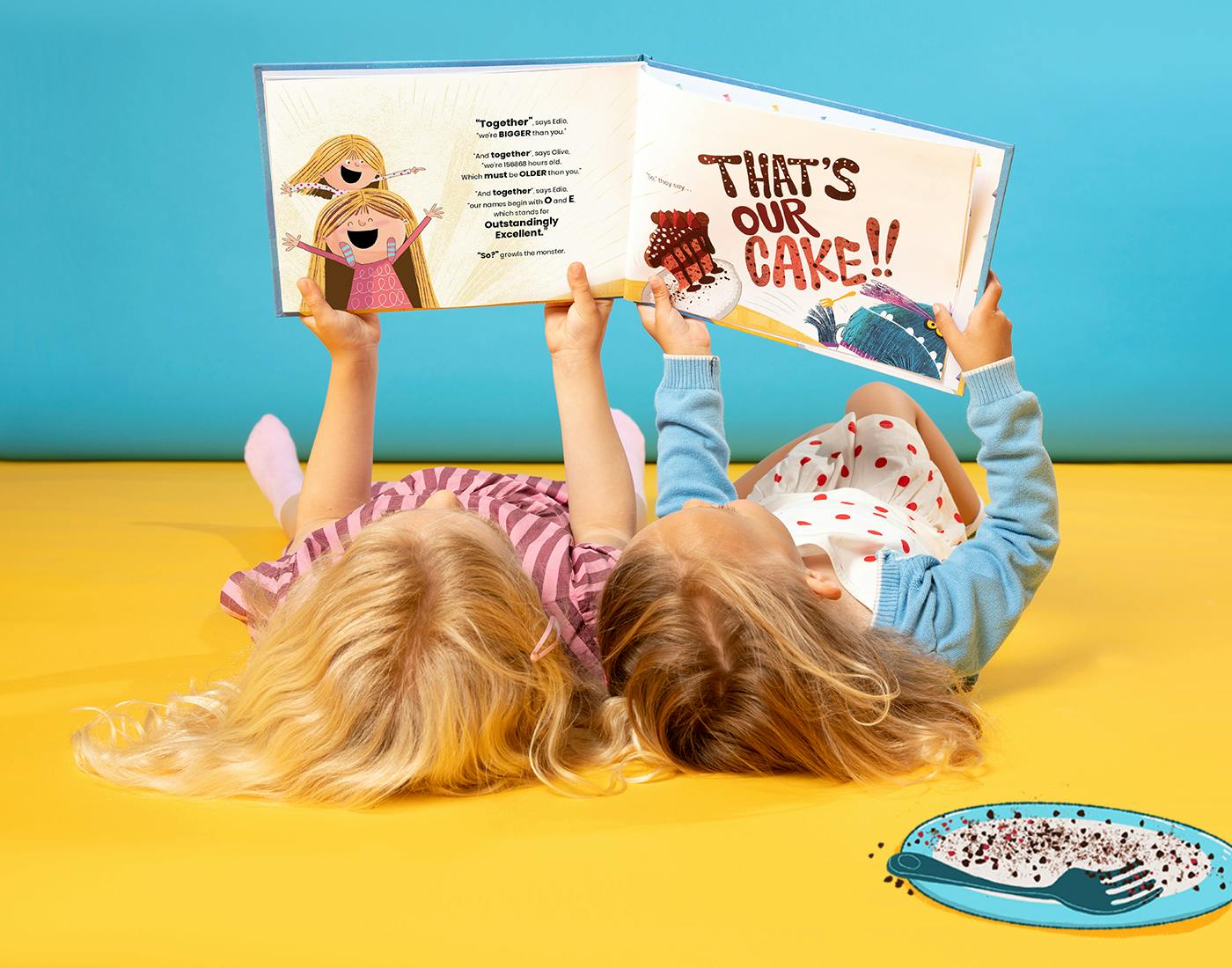 Two sisters reading the book together