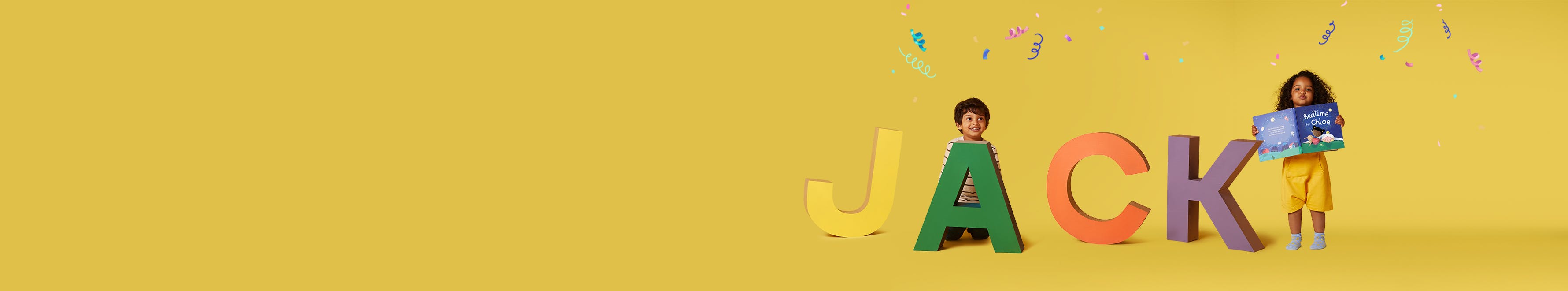 Large letters spelling our Jack and two children